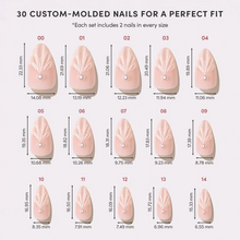 Honeymoon press-on nails featuring elegant soft pink almond-shaped nail set for a romantic style