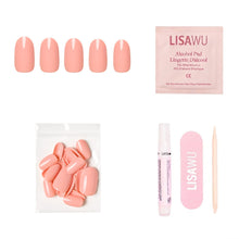 Peach Coral press-on nails in soft coral shade with glossy finish displayed on hand model